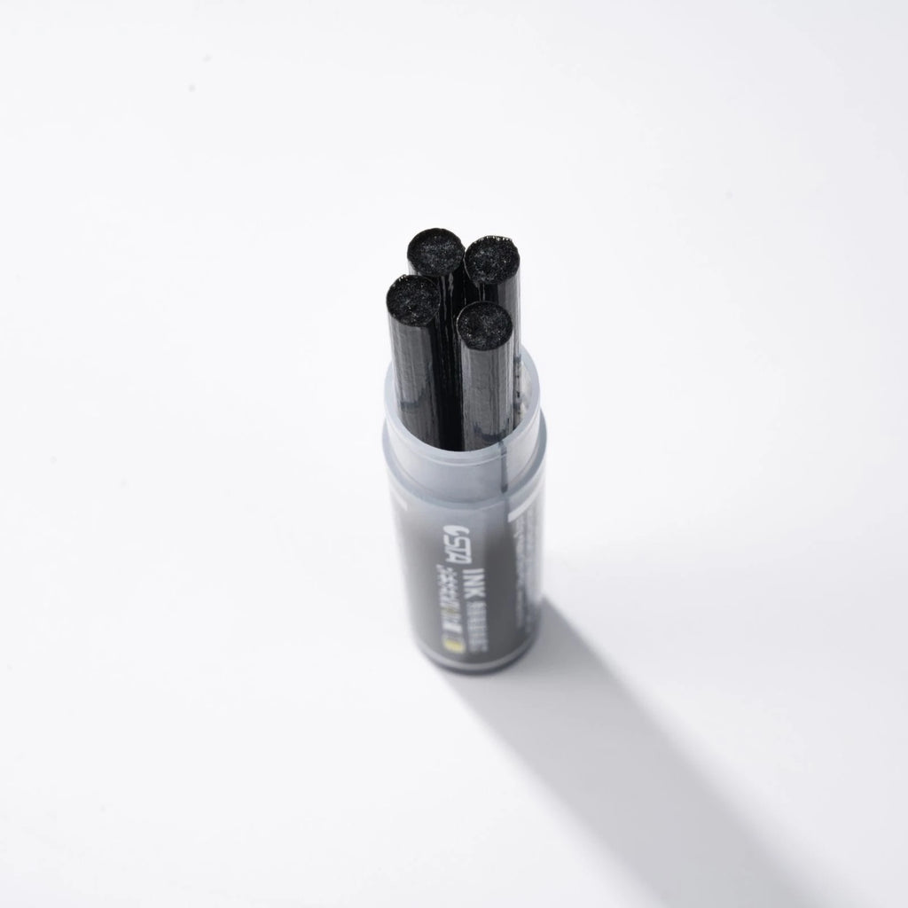 Open refill tube with black ink cartridges standing inside, on a white background