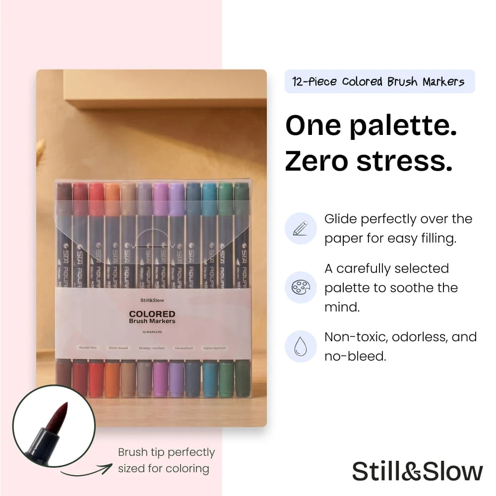 12-Piece Colored Brush Markers in their pack, with a brush tip sized for colouring and a non-toxic no-bleed ink