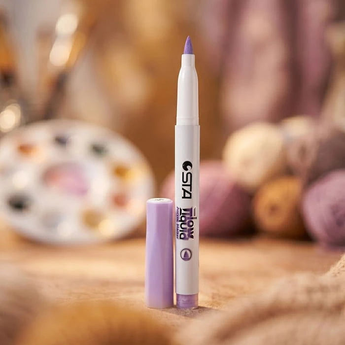Single lilac acrylic brush marker standing upright with its cap beside it